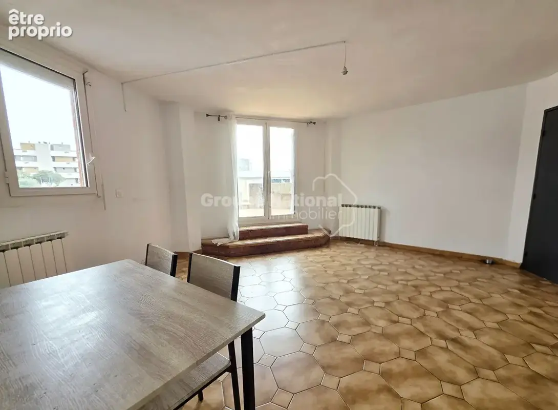 Appartement T4 avec terrasse et garage - photo 4