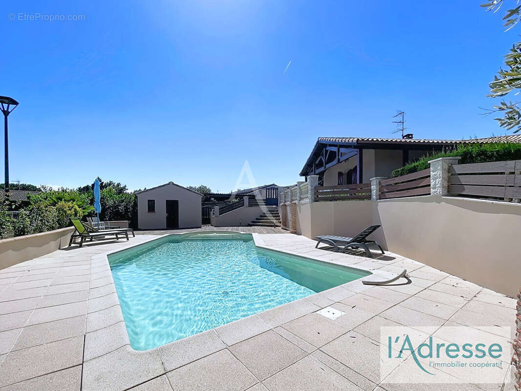 Maison T4 plain-pied avec piscine et sous-sol - Bruguières 31150 - photo 12