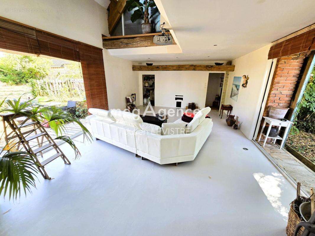 Maison de 6 pièces de 216m² - photo 4