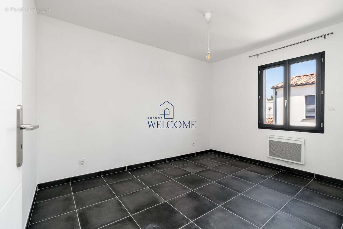 Maison 93 m² à Remoulins  - photo 8