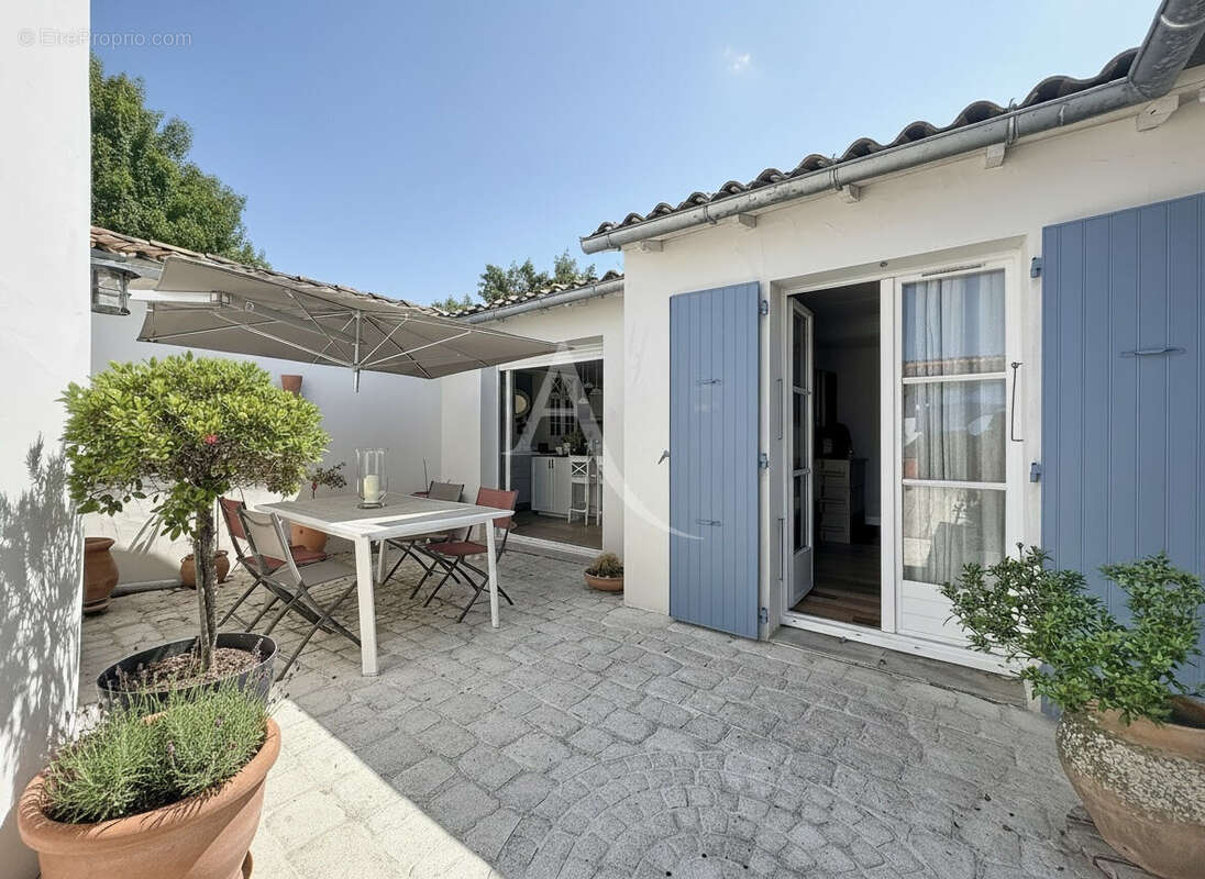 Villa de style rhétais 7 pièces - piscine chauffée - photo 11