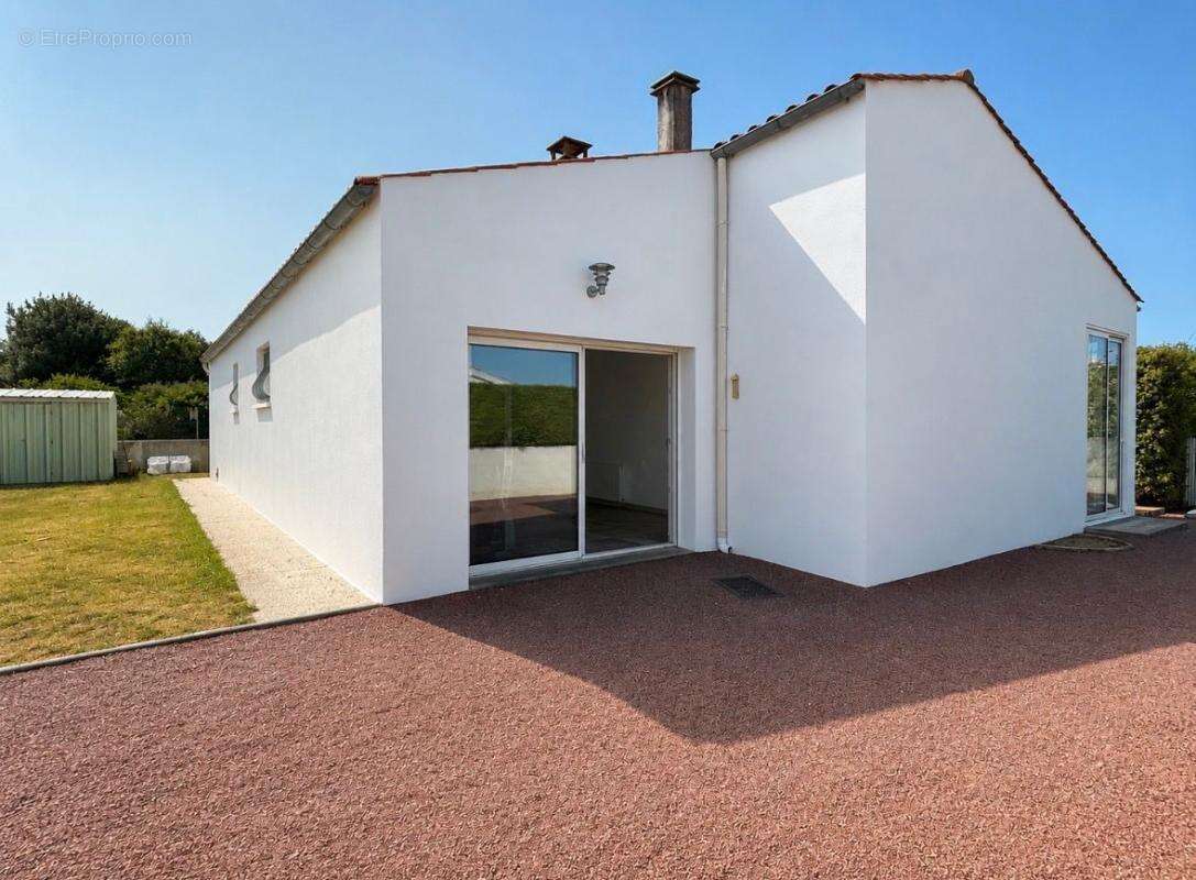 Maison 3 chambres avec jardin et garage, proche centre-ville - photo 2