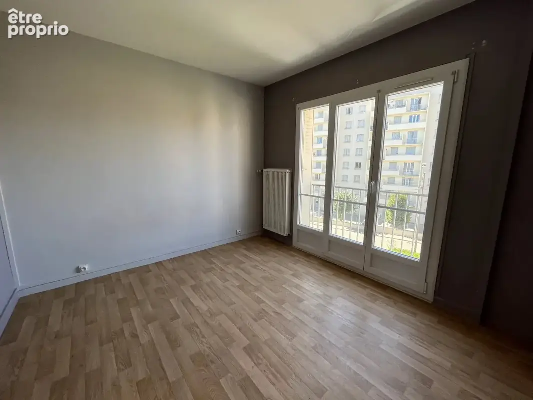 VALENCE - Appartement T3 loué avec balcons, cave et parking - photo 4