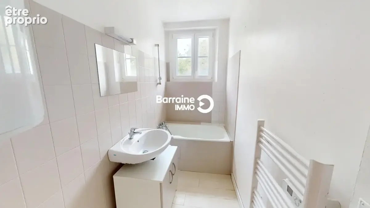 Appartement 4 pièces à vendre à Morlaix - 67.59 m², bon état, proche commodités - photo 13