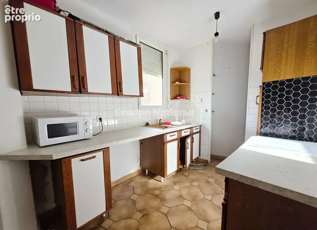 Appartement T4 avec terrasse et garage - photo 13