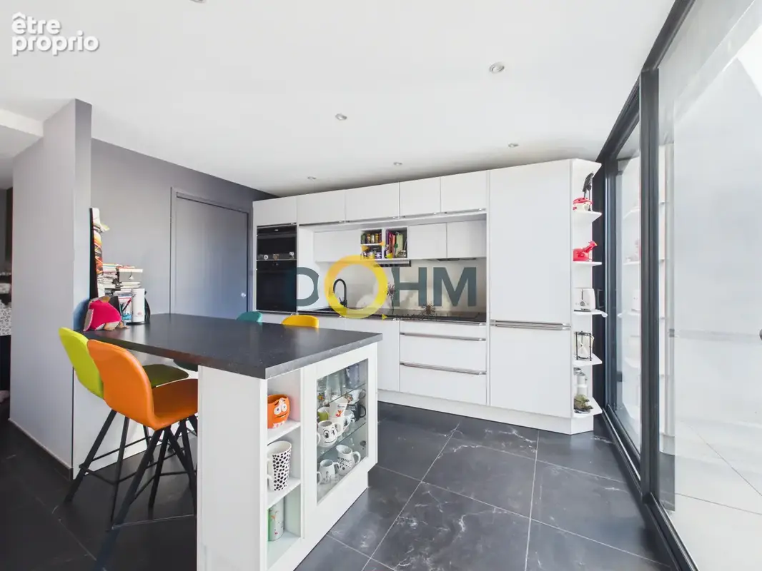 Centre-ville d'Yssingeaux - Duplex de 80,62 m2 avec terrasse, cave et place de stationnement. - photo 7