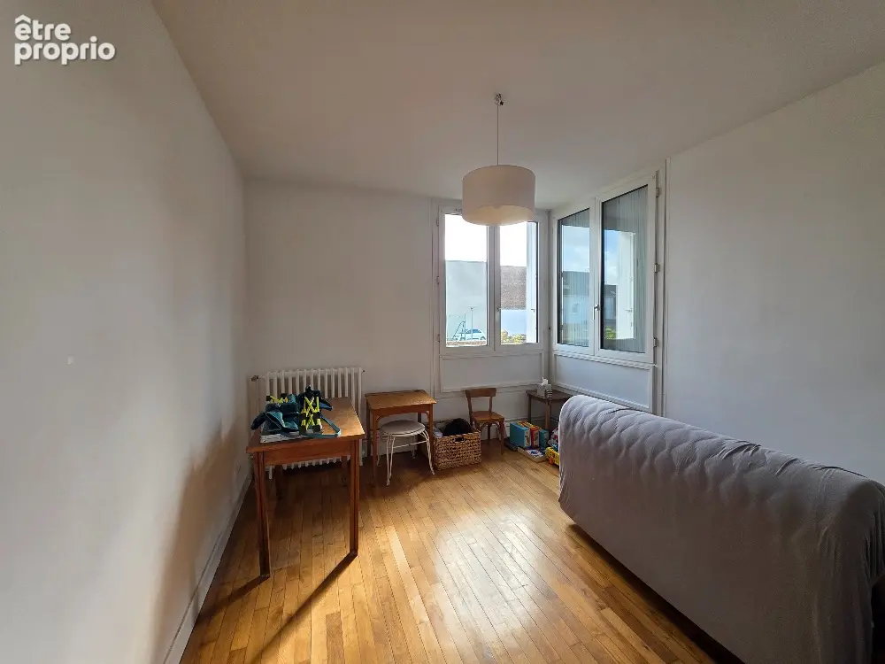 Appartement 97 m²  3 chambres  exposition ouest  cave - photo 6