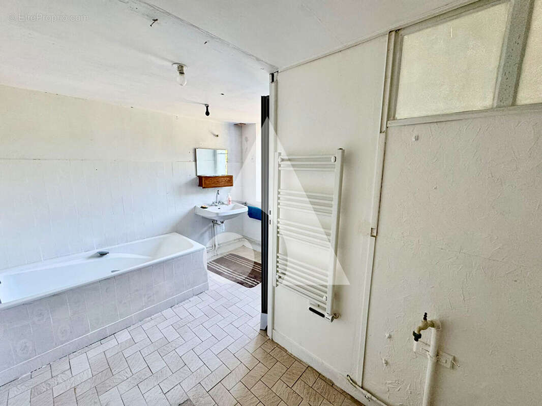 Agréable maison de village  avec garage et jardin à GONAINCOURT - photo 8