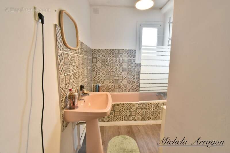 Villeneuve-sur-Lot – Appartement T3 plain-pied 82 m² avec grand jardin - photo 9