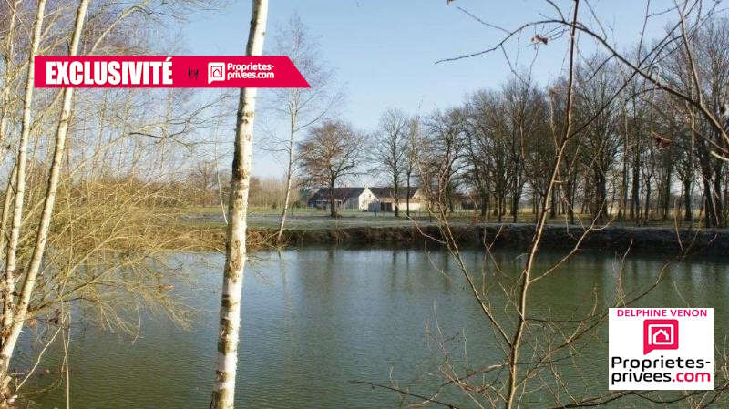 Exclusivité - Propriété avec beaucoup de cachet proche de Tigy ; Longère, Ecuries, piste d'entrainement, prés, bois et plan d'ea - photo 14