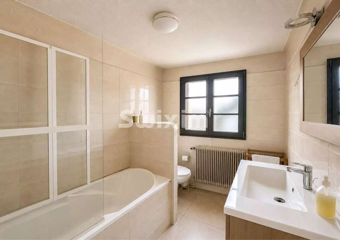 Appartement 4 pièces, trois chambres, combles et stationnement couvert - photo 8