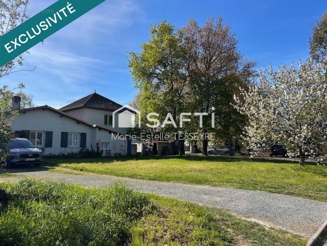 Photo 1 - Maison à MONTUSSAN