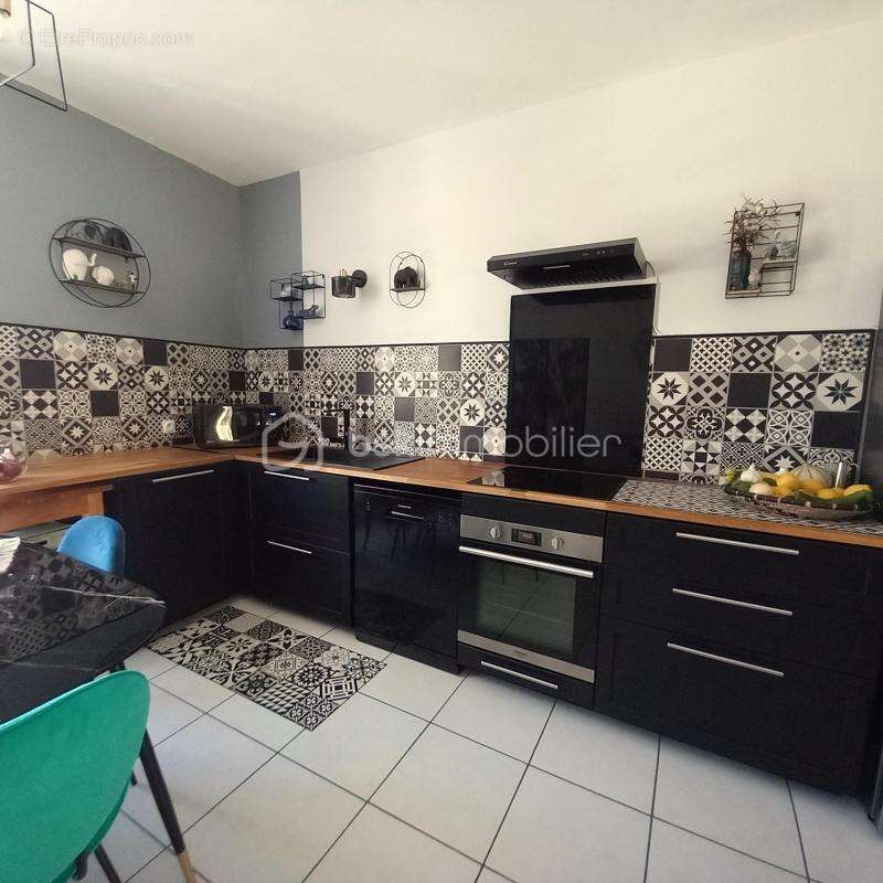 Appartement T2 + terrasse + cave + 2 parking - photo 4