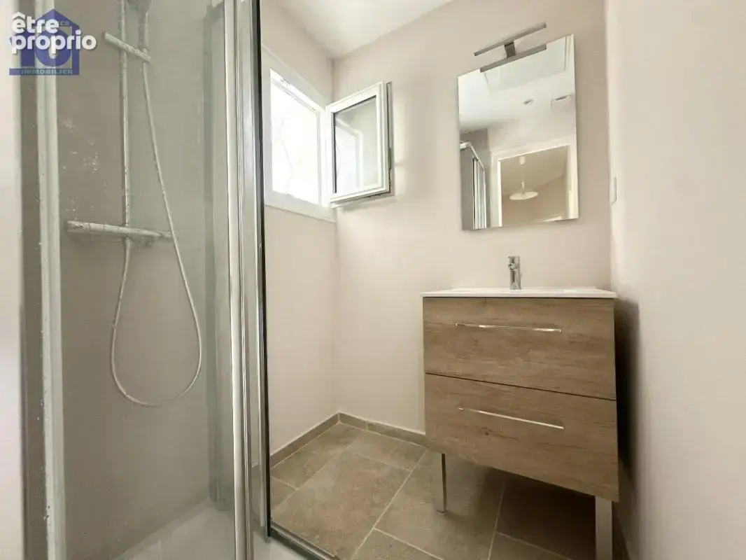 Appartement en rez-de-jardin - photo 5
