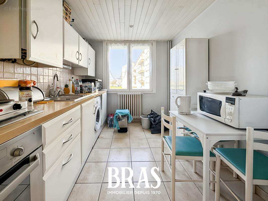 Saint sebastien sur loire - appartement t3 + cave + parking - photo 5