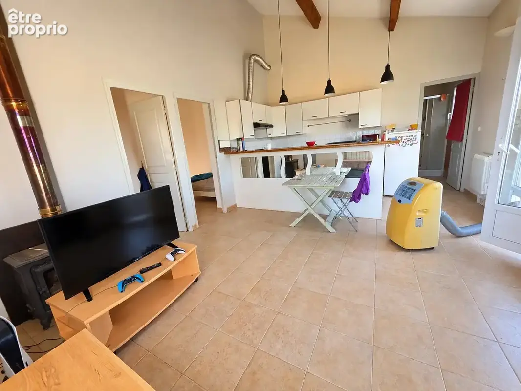 Appartement 3 pièces 53 m² à vendre à Saint-Quentin-La-Poterie (30700) - photo 4