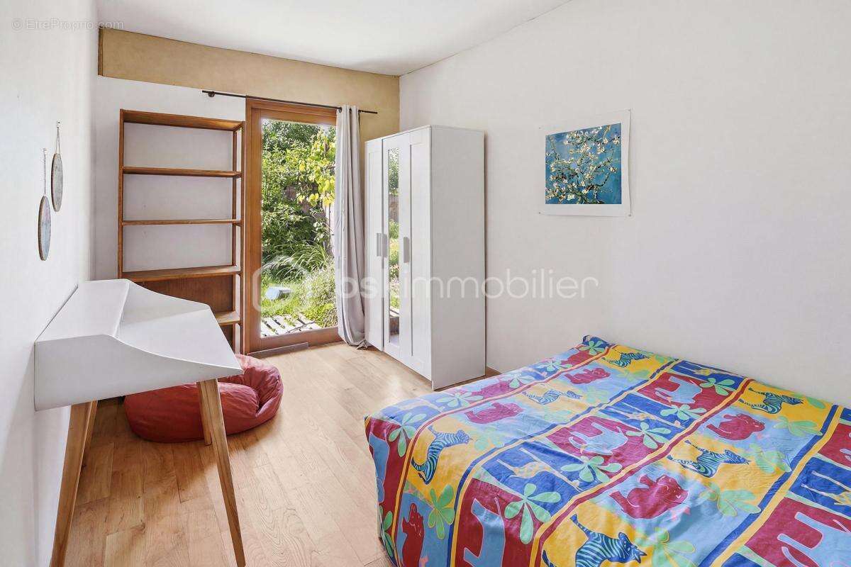 Nantes Ouest – Ensemble immobilier atypique de 236 m² avec deux maisons et studio indépendant - photo 12