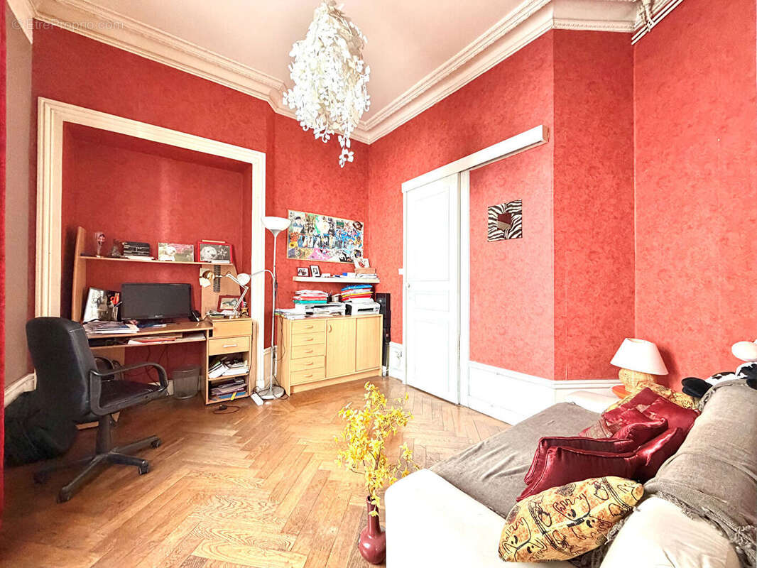 Appartement style haussmannien 113 m2 - photo 5