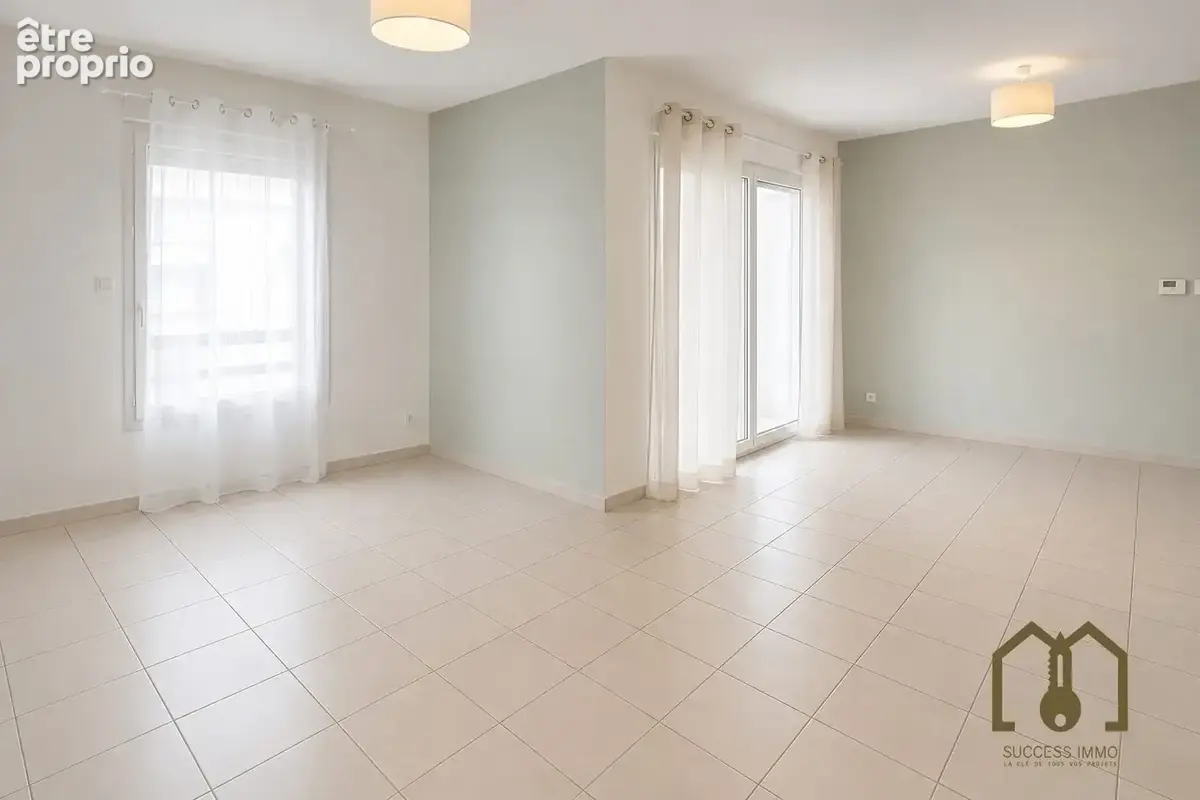 Appartement 62 m² à Saint-Priest  - photo 2