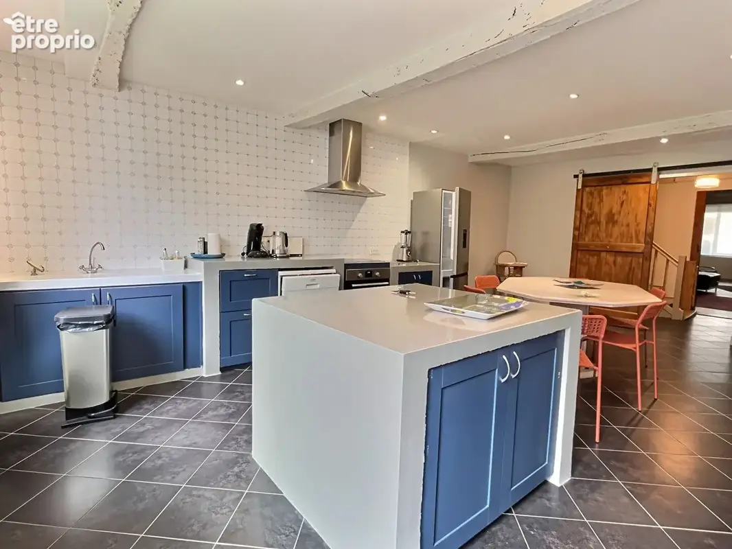 Villeneuve-sur-Lot, à deux pas du centre-ville, magnifique maison en pierre de 193 m² sur un terrain d'environ 180 m². Énorme co - photo 5