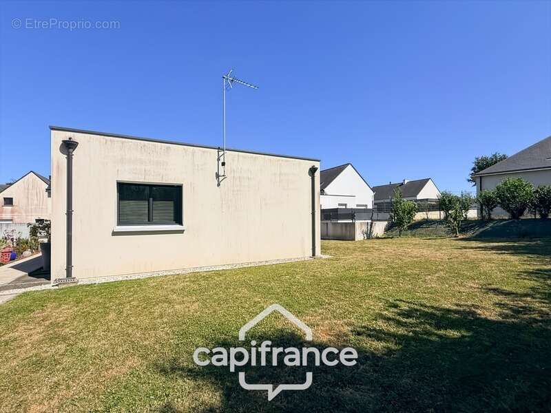 Maison contemporaine de plain-pied de 160 m² – 4 chambres – Véranda de 27 m² avec spa – Double garage – Carport – Noyal-Pontivy - photo 34
