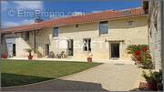 Photo 1 - Maison à LA ROCHE-RIGAULT