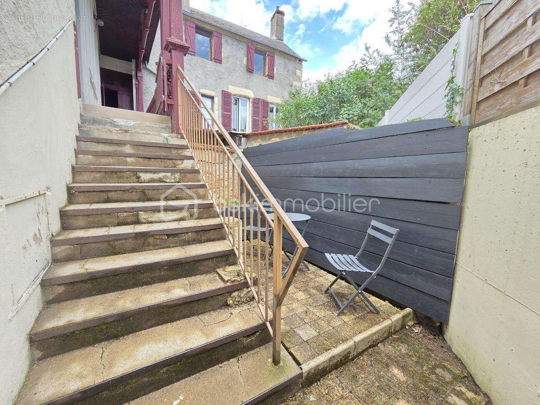 Magnifique appartement T3 de 101m² avec place de parking privative et cave en hypercentre ville de Nevers - photo 19