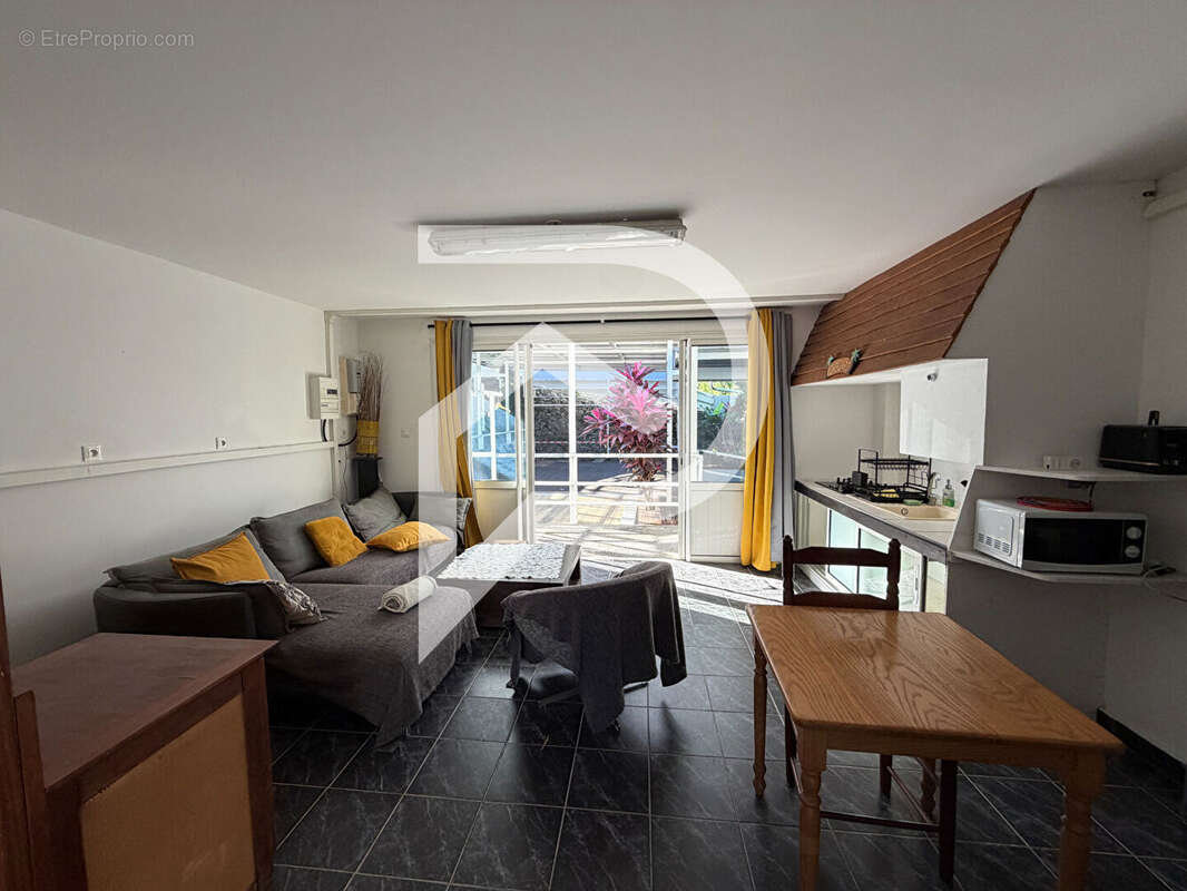 Un ensemble immobilier rare au coeur de Manapany-les-Bains - photo 6