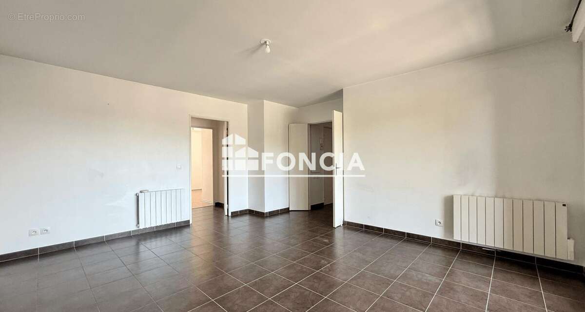Appartement T3 de 69 m² – Proche centre-ville de Bourgoin-Jallieu - photo 3