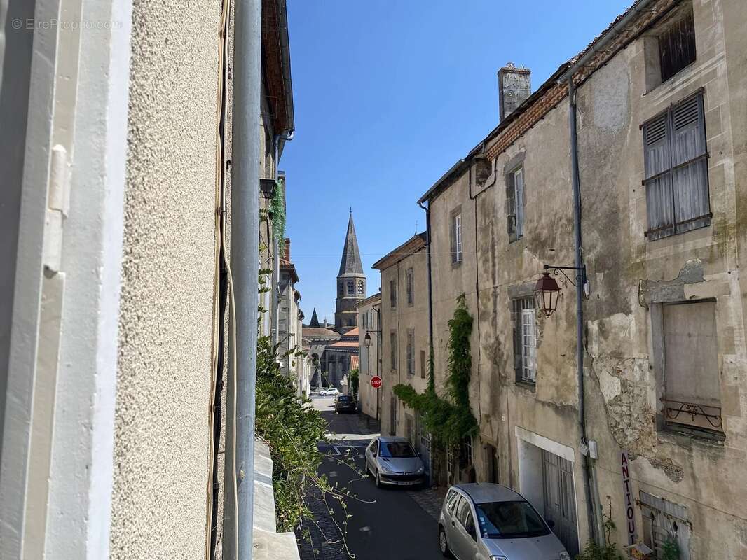 Maison de ville avec local commercial au Dorat - photo 3