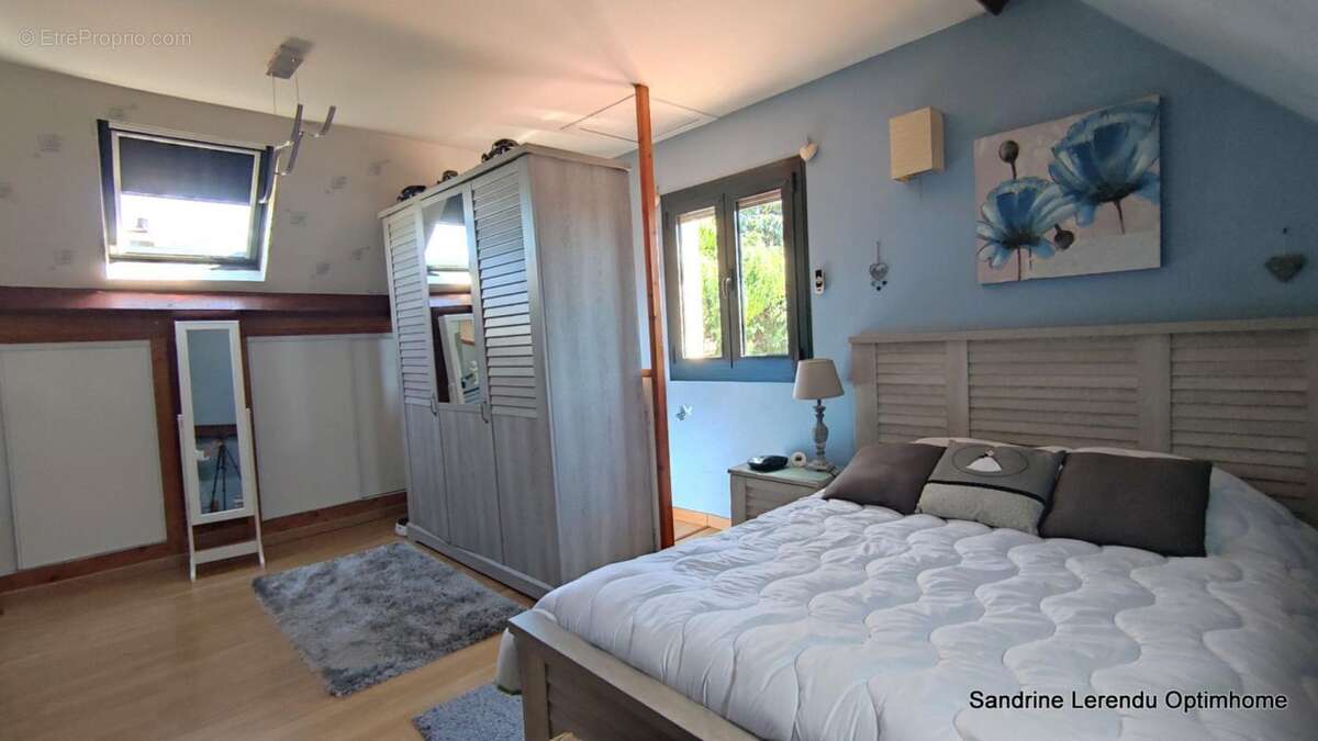 Une maison clé en main avec véranda contemporaine et possibilité de vivre de plain-pied. – 2 garages – Terrain 807 m² – Saint-Ou - photo 17