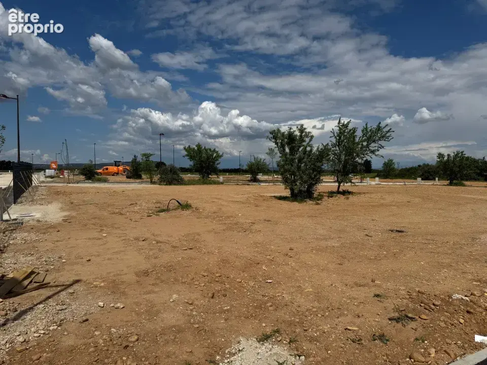 Terrain à LAUDUN-L'ARDOISE