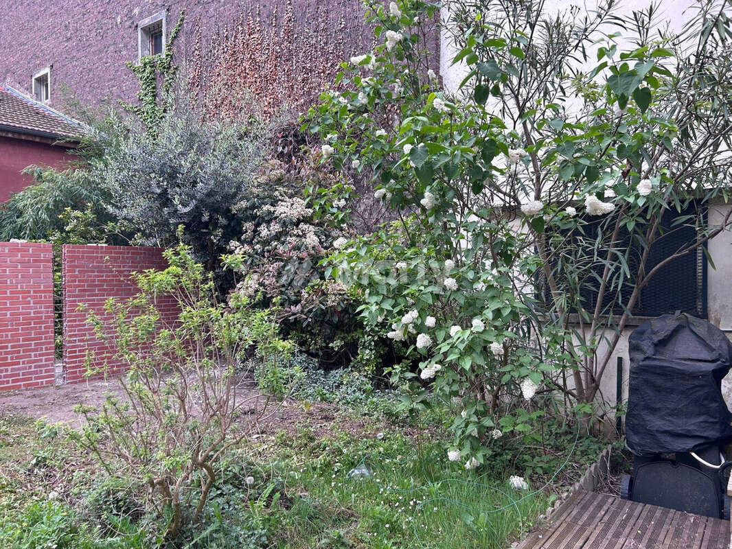 Maison à COURBEVOIE