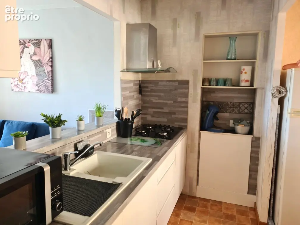 Immeuble de rapport - 2 appartements et 2 commerces - photo 4