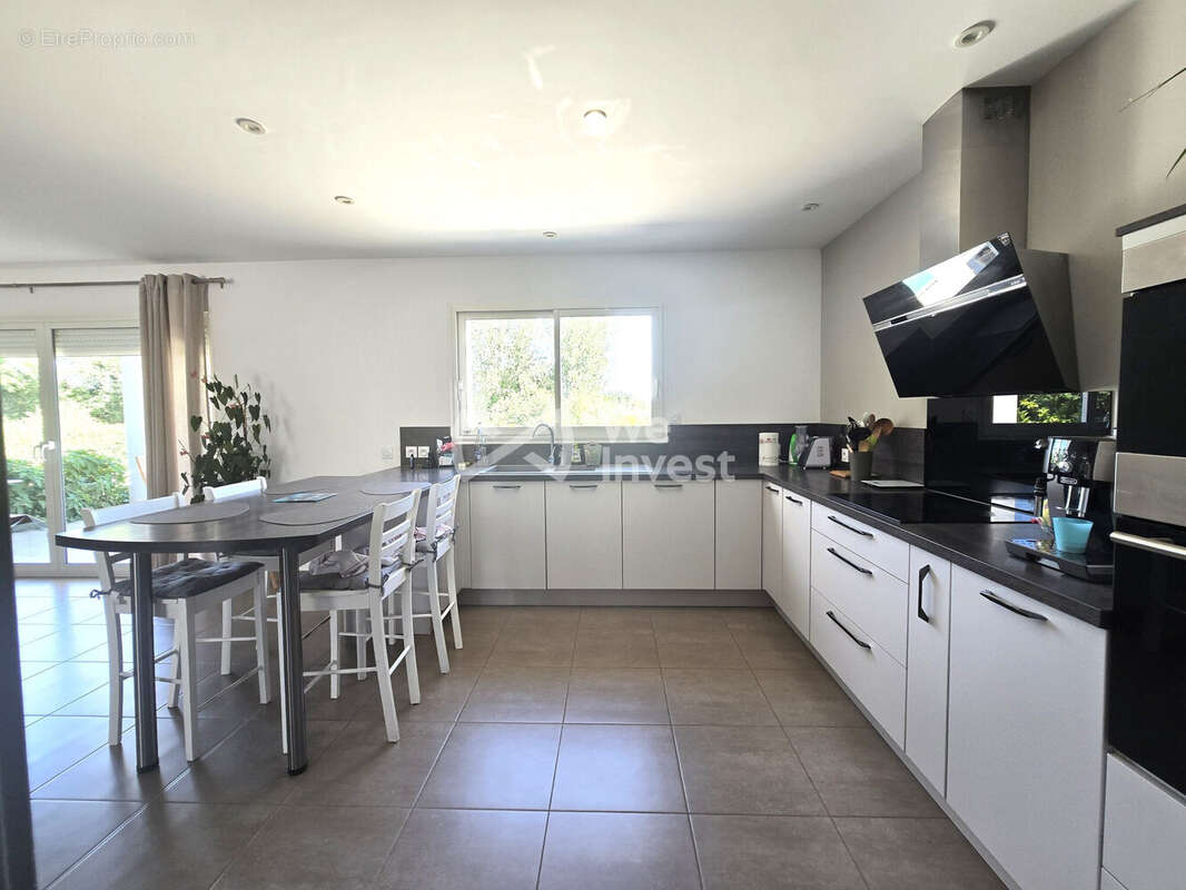 Maison 110 m² à Angeville  - photo 6