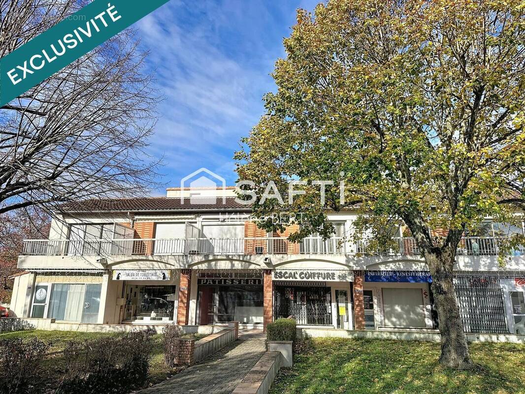 Photo 1 - Commerce à ESCALQUENS