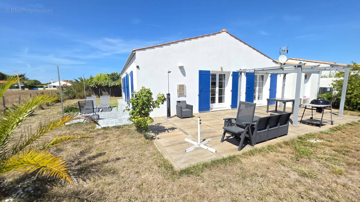Maison de plain-pied au calme   3 chambres, garage et terrain clos de 437 m2 - photo 1