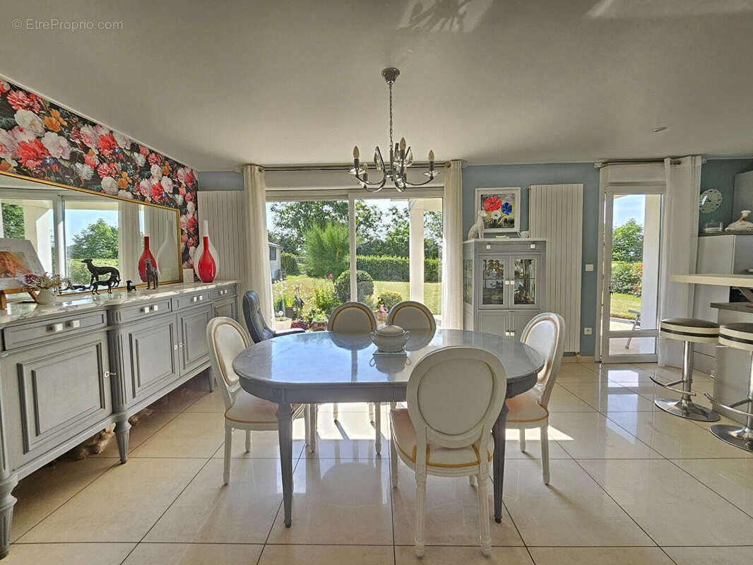 Maison d'exception à Vendre à Rivery - Un Écrin de Prestige de 200 m² - photo 7