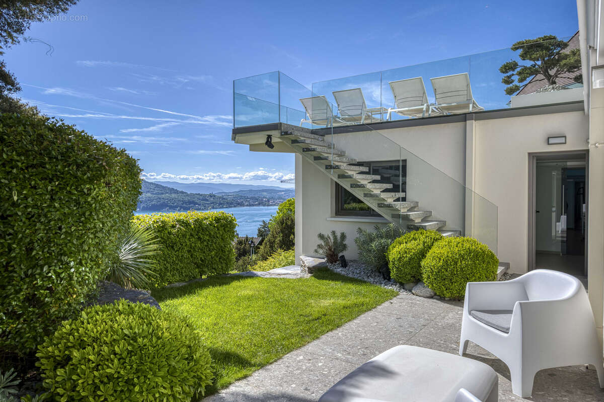 Villa d'exception dominant le lac - photo 77