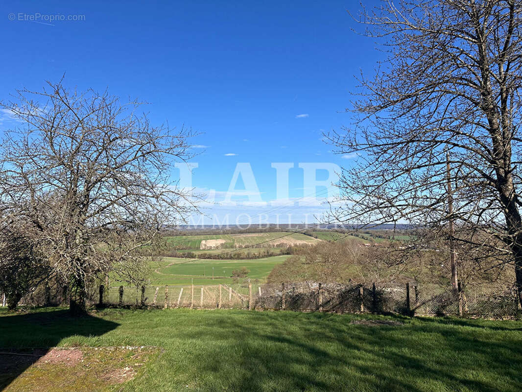 Maison à CONDE-SUR-HUISNE