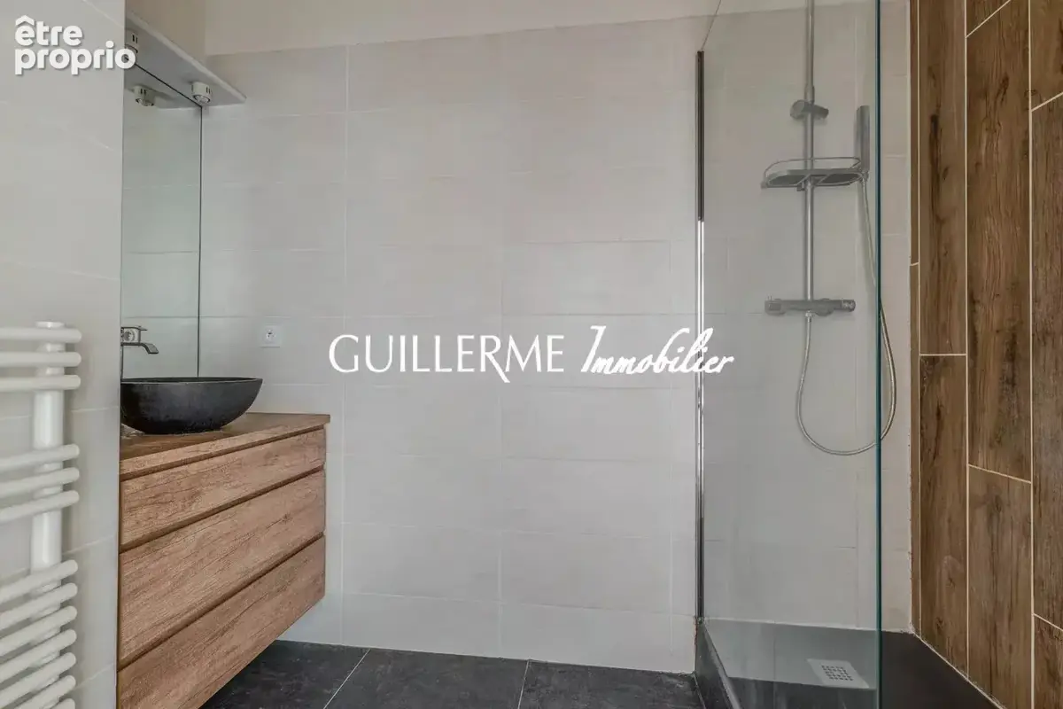 Appartement avec terrasse et jardin - Plein centre de Dardilly le haut - photo 10