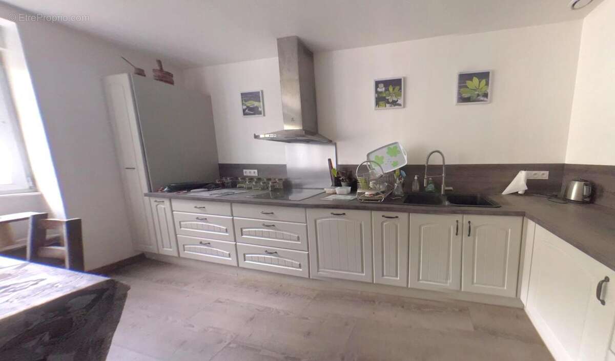 Maison 4 pièces 97 m² à vendre à Leuhan (29390) - photo 4