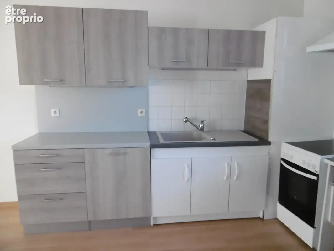 Ensemble immobilier - centre ville - 4 appartements + 1 local commercial - photo 4