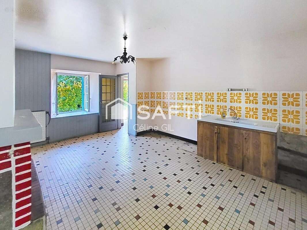 Photo 2 - Maison à PLEUGRIFFET