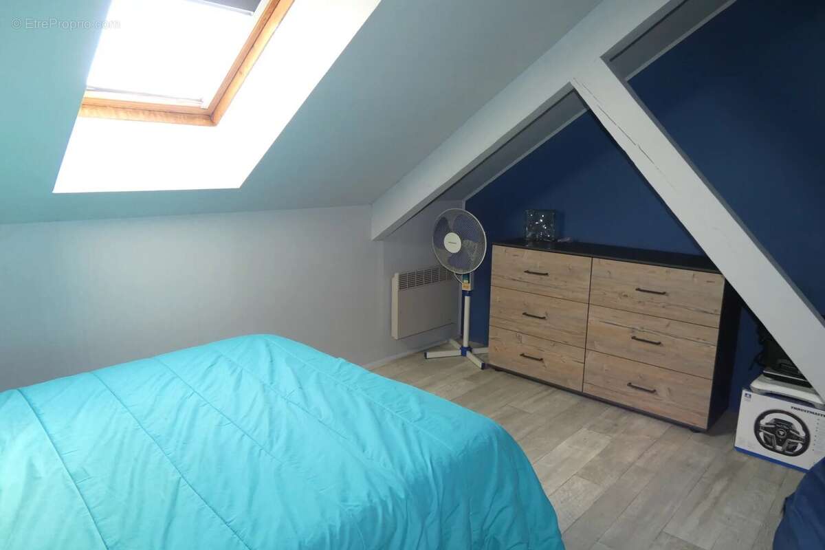Dans un charmant bourg proche de montcenis - pavillon sur sous-sol - photo 12