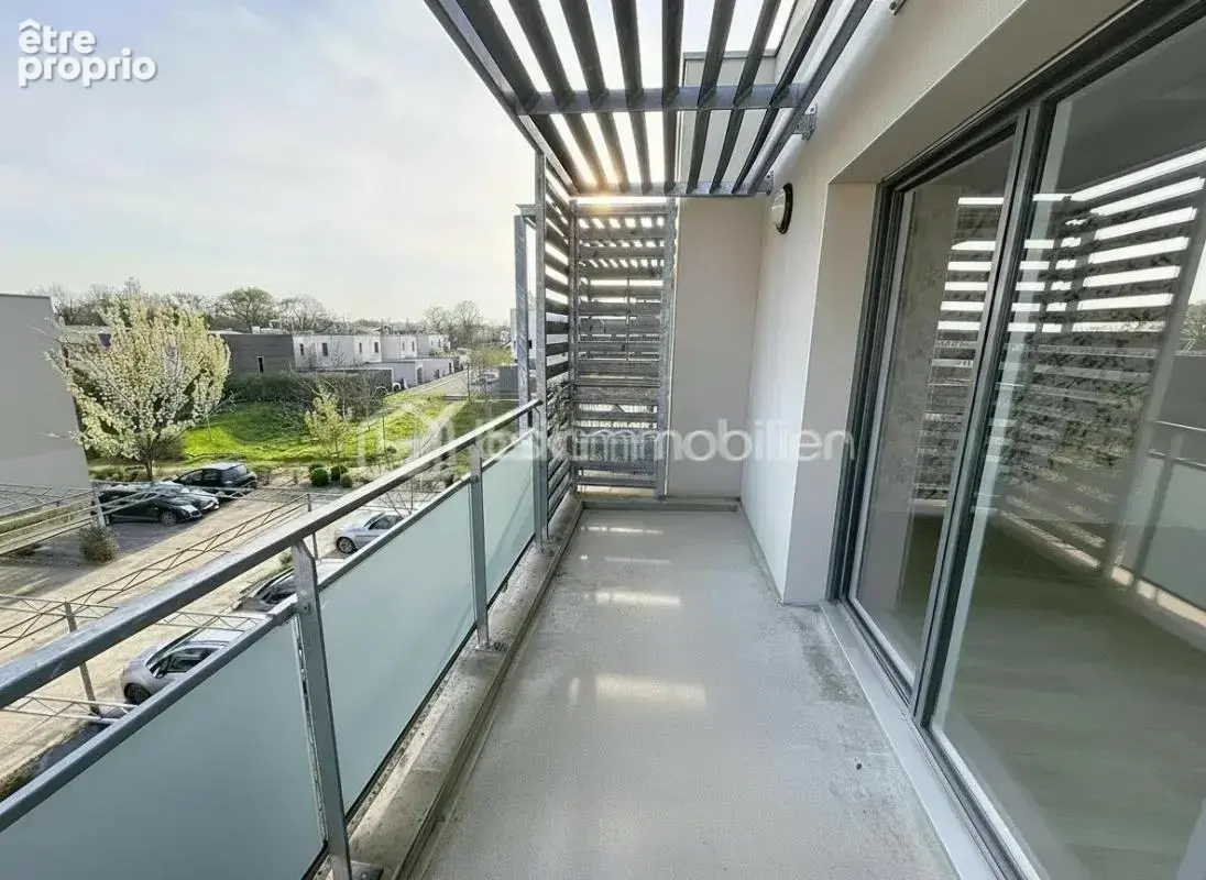 MORDELLES – T3 lumineux de 65 m² avec grand balcon plein sud et parking - photo 2