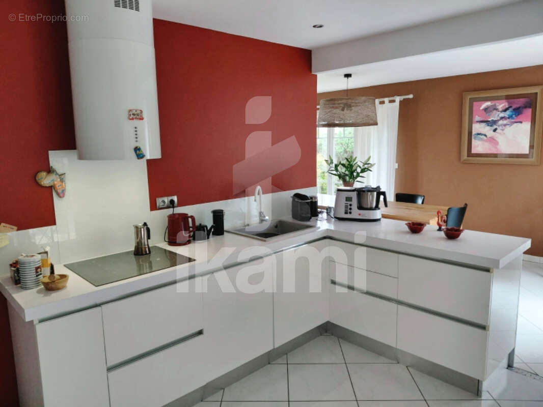 Maison à GENISSIEUX