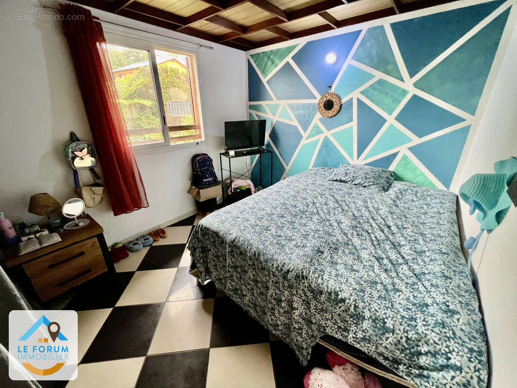 Tampon 97430 - villa à etage - volumes appreciables - fonctionnelle - quartier calme et verdoyant - photo 7