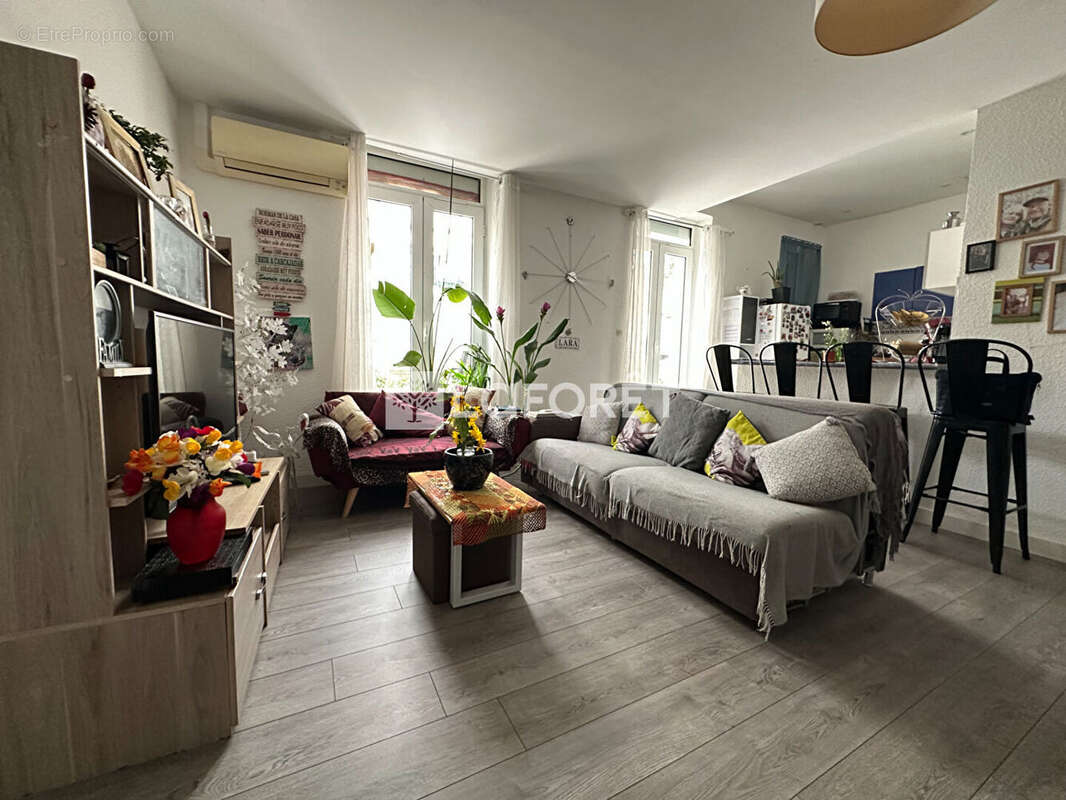Perpignan - Quartier prisé ! Superbe F2 bis en rez-de-jardin de plus de 80 m², vendu loué ! - photo 12