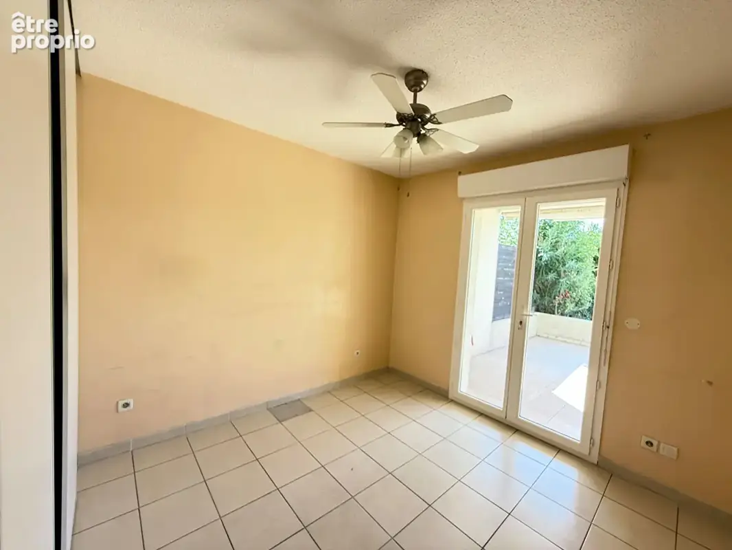Appartement en rez-de-jardin avec terrasse et place de parking privative63,65 - photo 8